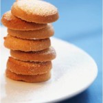 ginger snap cookies stacked in a pile