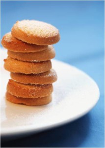 ginger snap cookies stacked in a pile