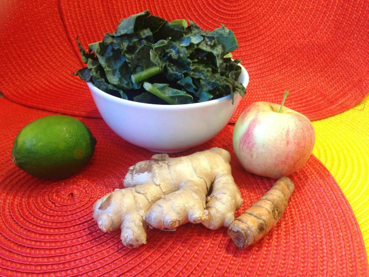 turmeric, ginger, lime, kale, and apple for turmeric smoothie