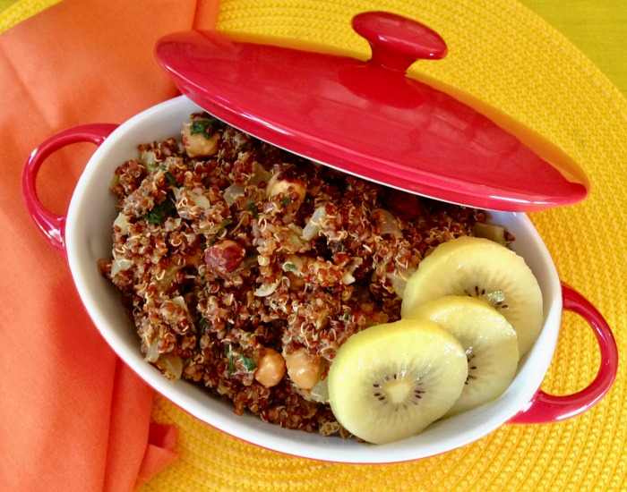 holiday quinoa stuffing with kiwi fruit in a red pot