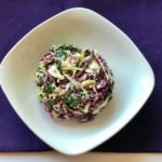 broccoli and veggie slaw in white bowl