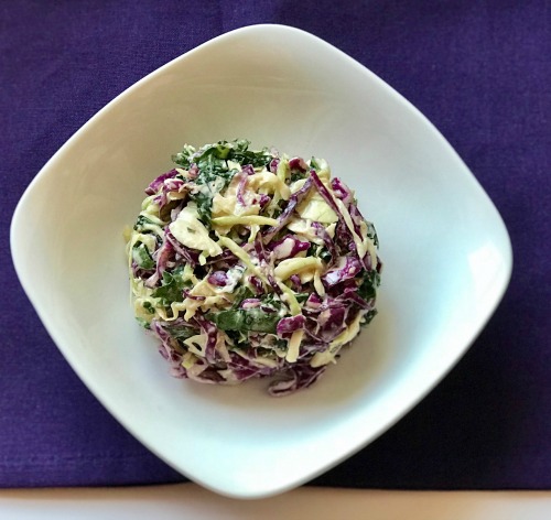 broccoli and veggie slaw in white bowl