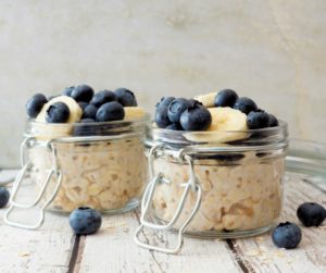 blueberry and coconut overnight oats in jars