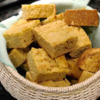 amaranth cornbread in basket with turquoise cloth