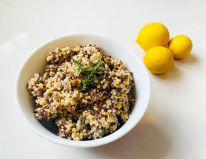 lemon quinoa dish with tahini and herbs