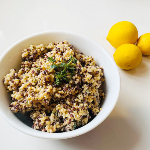 lemon quinoa dish with tahini and herbs